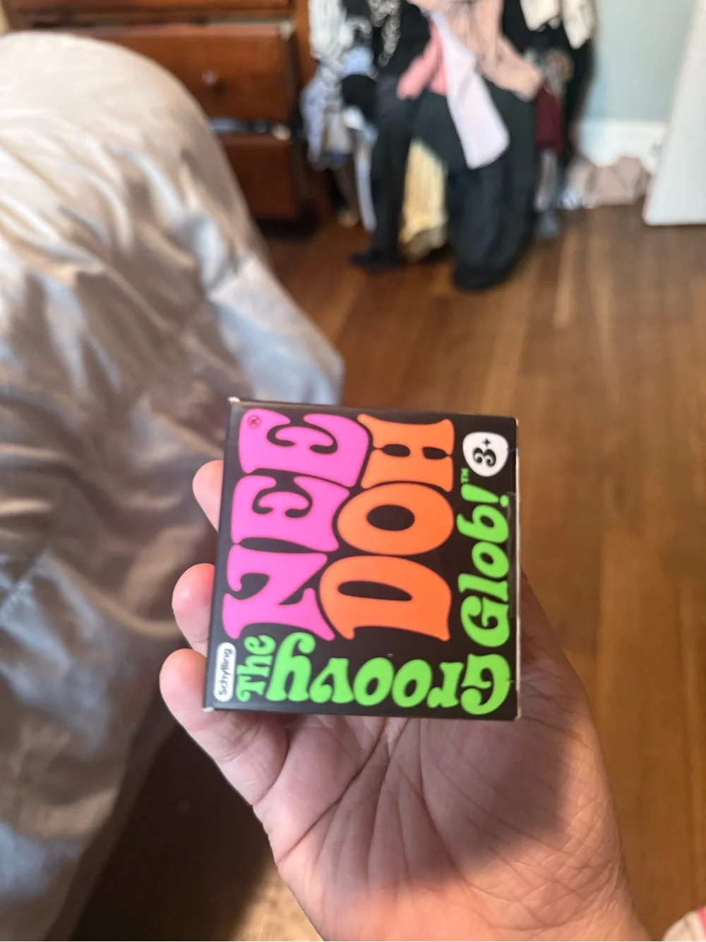 The Nee Doh Groovy Globi Stress Ball - Bright orange